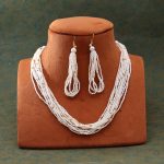 Traditional White Color Puwai Necklace Set With Graceful Pearl Detailing